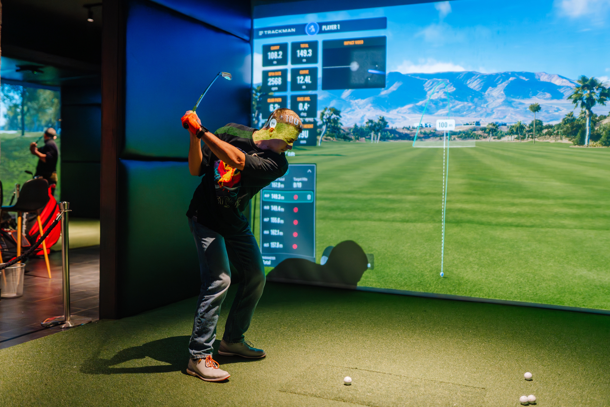 golf instructor Beachwood location Golf instructor Beachwood training session at indoor simulator with TrackMan technology